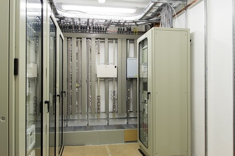 Packaged substation internal view showing protection panels and primary marshalling field